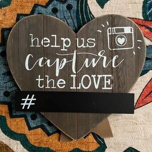 Heart-Shaped Wooden Sign with White Text